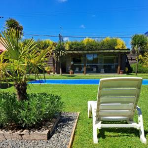 Κήπος έξω από το Hosteria y Cabañas Rucantu +7 φωτογραφίες