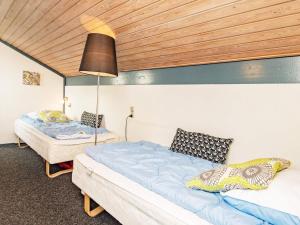 Postel nebo postele na pokoji v ubytování Holiday home Væggerløse CCXVI