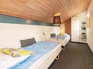 Postel nebo postele na pokoji v ubytování Holiday home Væggerløse CCXVI