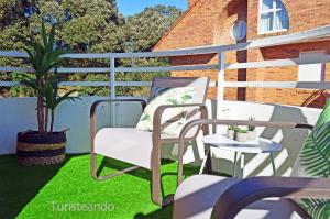 Balkón nebo terasa v ubytování Dúplex ANANDA, vistas impresionantes con parking y piscina comunitaria + 33 fotografií