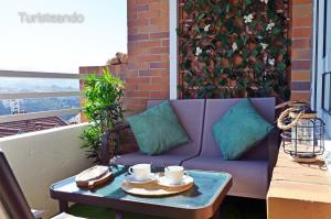 Posezení v ubytování Dúplex ANANDA, vistas impresionantes con parking y piscina comunitaria