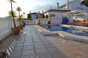 The swimming pool at or close to Villa Las Golondrinas