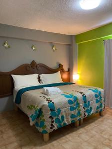 Postel nebo postele na pokoji v ubytování Cabo Tortuga Hotel Boutique