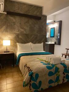 Postel nebo postele na pokoji v ubytování Cabo Tortuga Hotel Boutique