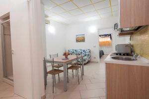 Kuchyň nebo kuchyňský kout v ubytování Hotel Maremma Sul Mare