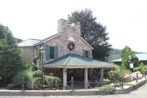 a house with a chimney on top of it at Foxburg Inn in Emlenton