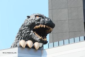 a dinosaur head on the side of a building at Hotel Gracery Shinjuku in Tokyo