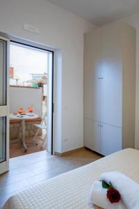 Postel nebo postele na pokoji v ubytování Hotel Maremma Sul Mare