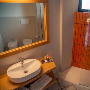 Koupelna v ubytování Magaggiari Hotel Resort