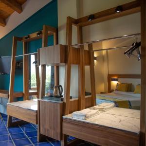 Postel nebo postele na pokoji v ubytování Magaggiari Hotel Resort