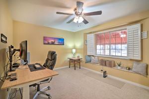 an office with a desk with a computer and a window at Lake Havasu City Vacation Rental with Pool! in Lake Havasu City
