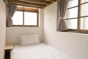 Letto o letti in una camera di 東衛參捌 陶藝旅店