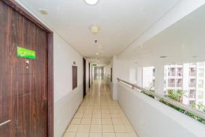 Fotografie z fotogalerie ubytování RedLiving Apartemen Serpong Green View - Hapukh Room Tower B v destinaci Ciater-hilir