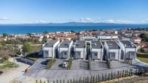 an aerial view of a row of houses at Panoramic Villa #1 in Hanioti