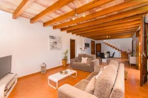 A television and/or entertainment centre at Finca SERA Caimari by Mallorca Villa Selection