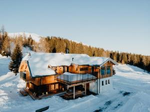 Obiekt Chalet Knappenhütte zimą