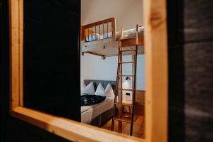Łóżko lub łóżka w pokoju w obiekcie Chalet Knappenhütte