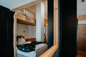 Łóżko lub łóżka w pokoju w obiekcie Chalet Knappenhütte