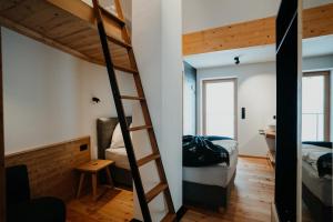 Łóżko lub łóżka w pokoju w obiekcie Chalet Knappenhütte