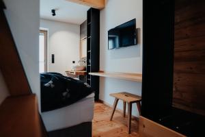 Telewizja i/lub zestaw kina domowego w obiekcie Chalet Knappenhütte