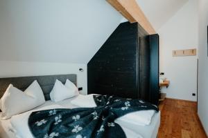 Łóżko lub łóżka w pokoju w obiekcie Chalet Knappenhütte