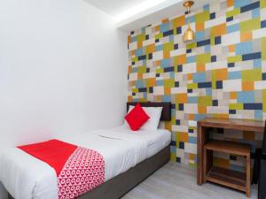 Postel nebo postele na pokoji v ubytování Big Big Hotel