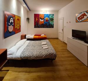 Llit o llits en una habitació de APT Re di Roma
