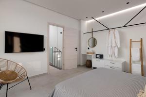 Posteľ alebo postele v izbe v ubytovaní Lido White Villa