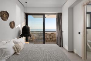 Posteľ alebo postele v izbe v ubytovaní Lido White Villa