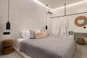 Posteľ alebo postele v izbe v ubytovaní Lido White Villa