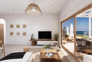 TV a/nebo společenská místnost v ubytování Ducato di Zante Luxury Beach Villa, by ZanteWize