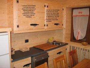 Kuchyň nebo kuchyňský kout v ubytování B & B Le Riue