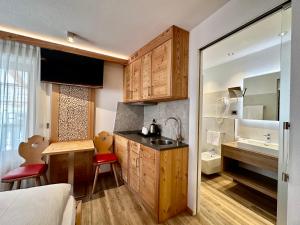 Køkken eller tekøkken på Cesa Planber Apartments Mountain View SKI-IN SKI-OUT