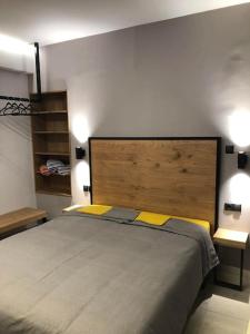 Un pat sau paturi într-o cameră la Vv Cosy Host 1