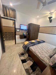 Postel nebo postele na pokoji v ubytování House Of Comfort Delhi
