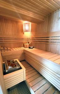 a inside of a sauna with a bench in it at Villa Eris Amalfi Coast in Conca dei Marini