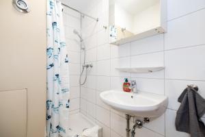 Koupelna v ubytování Nette Apartments mit Terrasse + 22 fotografií