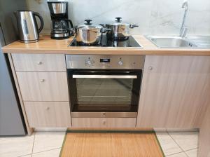 Kuchyňa alebo kuchynka v ubytovaní Amelie Apartment