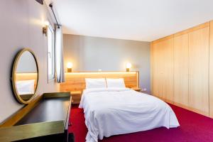 Voodi või voodid majutusasutuse HOTEL TURAN toas
