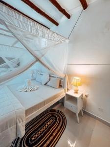 Met Beach Resort Malindi客房内的一张或多张床位