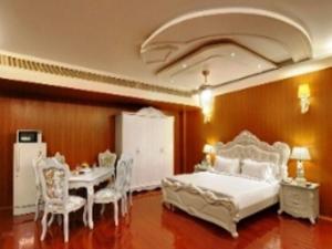Voodi või voodid majutusasutuse Hotel SS Palace toas