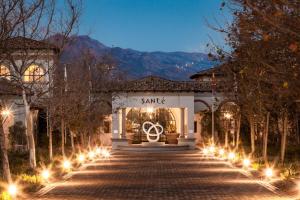 a museum with a statue in front of a building with lights at Santé Wellness Retreat & Spa in Paarl