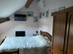 Ein Bett oder Betten in einem Zimmer der Unterkunft Le Castillon