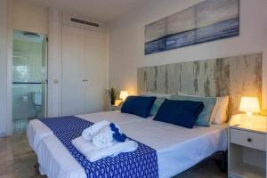 Posteľ alebo postele v izbe v ubytovaní Apartamento Pink Calm