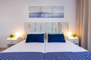 Posteľ alebo postele v izbe v ubytovaní Apartamento Pink Calm
