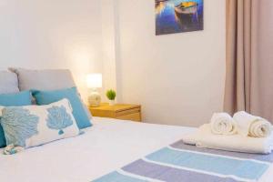 Posteľ alebo postele v izbe v ubytovaní Apartamento Pink Calm