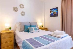 Posteľ alebo postele v izbe v ubytovaní Apartamento Pink Calm