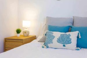 Posteľ alebo postele v izbe v ubytovaní Apartamento Pink Calm