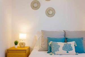 Posteľ alebo postele v izbe v ubytovaní Apartamento Pink Calm