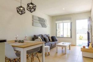 Posezení v ubytování Bungalow Pink garden - Winter by the Sea